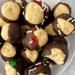 Want a delicious no bake candy for the holidays? These Buckeyes are so tasty and easy to make, you just need a few ingredients. This Best Buckeye Recipe is a sure way to please a crowd. They are the perfect holiday treat.