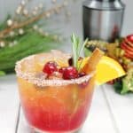 Craving a tasty pick-me-up to enjoy this holiday season? Look no further than the Naughty and Nice Cocktail. This Christmas cocktail recipe is a perfect blend of cranberry, orange, and grapefruit juices with whiskey and more!