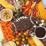 Host your family and friends over for the big game and serve this tasty and fun Football Charcuterie. It’s easy to assemble, contains lots of flavorful ingredients, and will be a huge hit at your game day party.