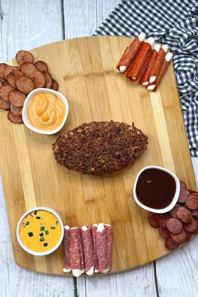 Host your family and friends over for the big game and serve this tasty and fun Football Charcuterie. It’s easy to assemble, contains lots of flavorful ingredients, and will be a huge hit at your game day party.