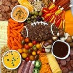 Host your family and friends over for the big game and serve this tasty and fun Football Charcuterie. It’s easy to assemble, contains lots of flavorful ingredients, and will be a huge hit at your game day party.