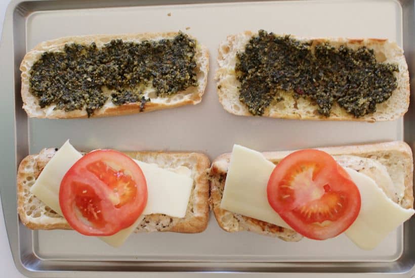 Skip the traditional ham and cheese and make a more fulfilling meal with these Pesto Chicken Sandwiches. Made with chicken, cheese, and tomatoes, you will love the taste of this flavorful sandwich.
