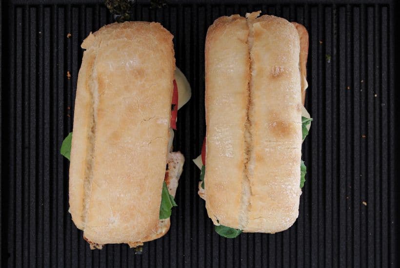 Skip the traditional ham and cheese and make a more fulfilling meal with these Pesto Chicken Sandwiches. Made with chicken, cheese, and tomatoes, you will love the taste of this flavorful sandwich.