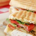 Skip the traditional ham and cheese and make a more fulfilling meal with these Pesto Chicken Sandwiches. Made with chicken, cheese, and tomatoes, you will love the taste of this flavorful sandwich.