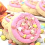 Enjoy a sweet holiday treat with these flavorful Copycat Crumbl Easter Whopper Cookies. From the bright pink frosting to their slightly soft texture, these cookies are sure to put a smile on your face!