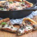 Who says you need takeout when you’re in the mood for pizza? Give this savory and delicious Cast Iron Skillet Pizza recipe a try, you won’t be disappointed! It's an easy homemade pizza recipe.