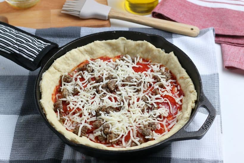 Who says you need takeout when you’re in the mood for pizza? Give this savory and delicious Cast Iron Skillet Pizza recipe a try, you won’t be disappointed! It's an easy homemade pizza recipe.