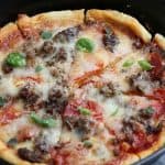 Who says you need takeout when you’re in the mood for pizza? Give this savory and delicious Cast Iron Skillet Pizza recipe a try, you won’t be disappointed! It's an easy homemade pizza recipe.