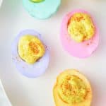 This easy recipe for Colorful Dyed Easter Deviled Eggs will take your deviled eggs to the next level this Easter. They're bright, fun, and super flavorful!