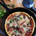 Who says you need takeout when you’re in the mood for pizza? Give this savory and delicious Cast Iron Skillet Pizza recipe a try, you won’t be disappointed! It's an easy homemade pizza recipe.