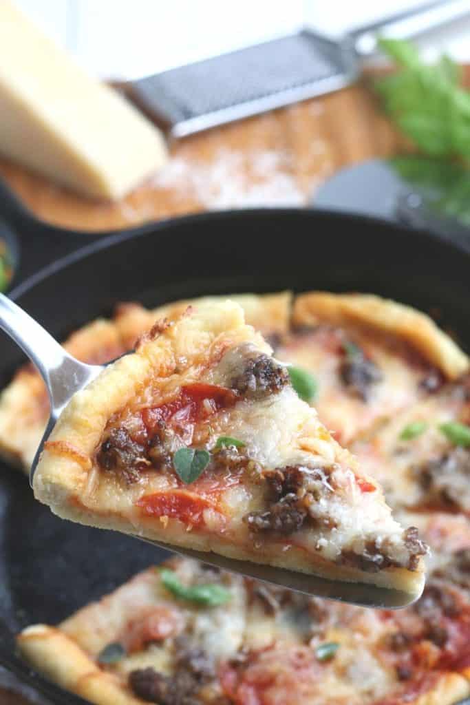 Who says you need takeout when you’re in the mood for pizza? Give this savory and delicious Cast Iron Skillet Pizza recipe a try, you won’t be disappointed! It's an easy homemade pizza recipe.