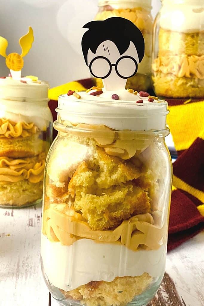 Harry Potter lovers can rejoice over this fun, flavorful recipe for Butterbeer Cake Jars. They're a sweet, decadent treat, perfect for serving at Harry Potter-themed parties!