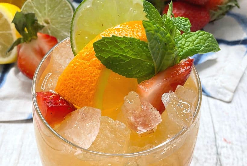 Who says you need to visit the bar for fresh, flavorful adult-friendly beverages? Learn how to easily prepare an incredible White Wine Sangria in no time with this simple, stress-free recipe. This is an easy summer drink recipe.