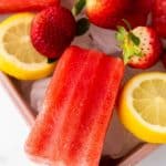 Cool down on a warm summer day with these refreshingly delicious Strawberry Lemon Popsicles. They’re fruity, flavorful, and naturally good for you. This easy popsicle recipe is a great treat for kids and adults.