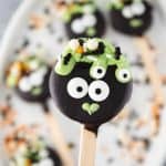 These cute Cauldron Oreo Pops for Halloween are a fun treat to celebrate spooky season. This Halloween recipe is easy to make and fun to eat.