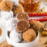 This easy rum balls recipe is part nostalgia and part holiday tradition. These rum balls are a blend of liquor, chocolate, walnuts and cookies, rolled together and coated in powdered sugar or cocoa. This easy no-bake recipe is a must for the holidays.