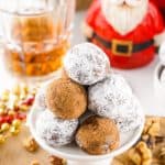 This easy rum balls recipe is part nostalgia and part holiday tradition. These rum balls are a blend of liquor, chocolate, walnuts and cookies, rolled together and coated in powdered sugar or cocoa. This easy no-bake recipe is a must for the holidays.