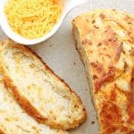 If you're anything like me, cheese and bread are two of your favorite things. But what if I told you it's possible to combine the two to make something incredible? With just five simple ingredients, this recipe for Artisan No-Knead Cheddar Bread proves that you certainly can have the best of both worlds!