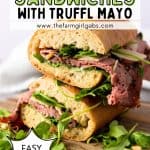 This Roast Beef Sandwich is no ordinary sandwich! With medium-rare roast beef, arugula, shaved parmesan, and roasted pine nuts, this roast beef sandwich is over-the-top delicious. And when you slather on that homemade truffle mayo it becomes absolute perfection.