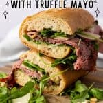 This Roast Beef Sandwich is no ordinary sandwich! With medium-rare roast beef, arugula, shaved parmesan, and roasted pine nuts, this roast beef sandwich is over-the-top delicious. And when you slather on that homemade truffle mayo it becomes absolute perfection.