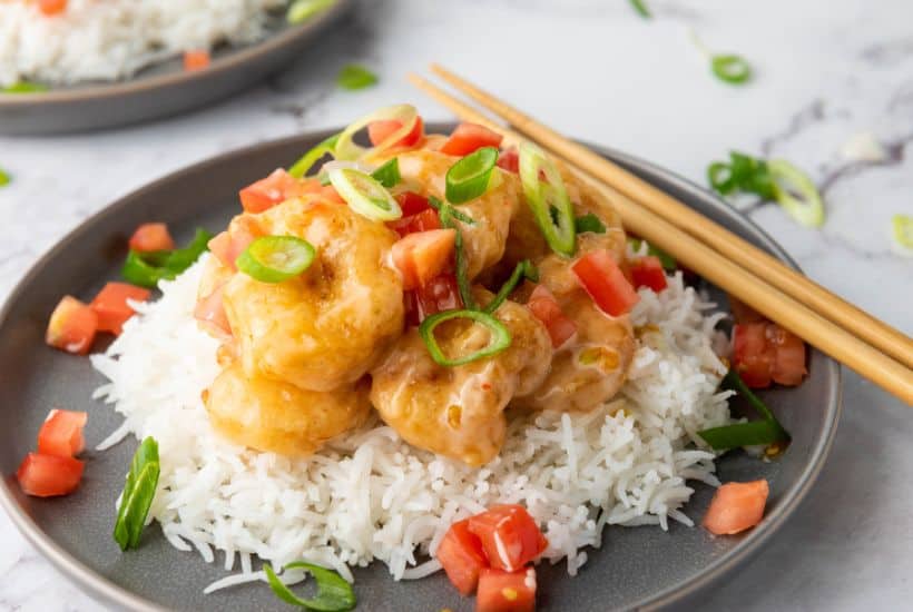 This Bang Bang Shrimp recipe is delicious and so easy! The perfectly cooked shrimp are coated in a flavorful spicy sauce to make the perfect appetizer or a main meal when served over rice. This easy recipe is my version of the popular Bonefish grill bang bang shrimp.