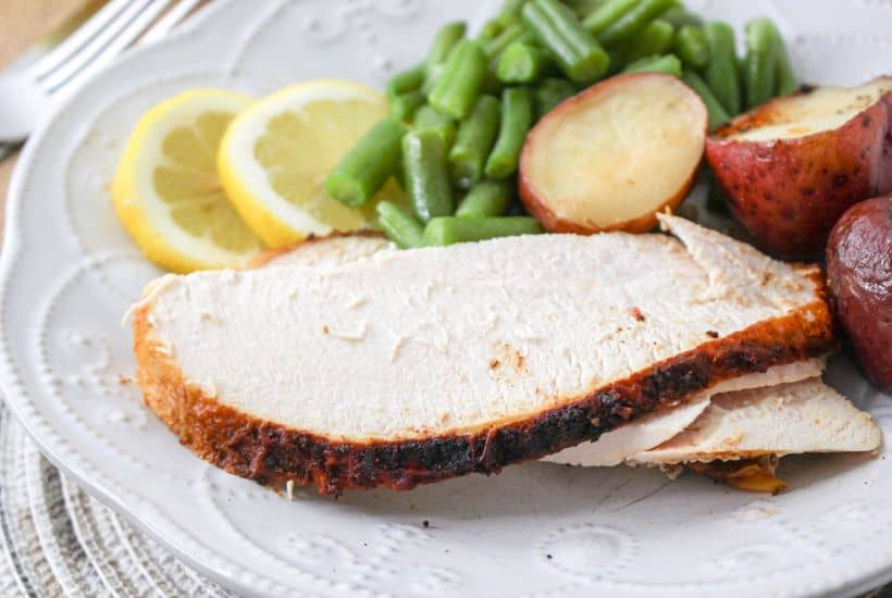 This Dutch Oven Roasted Chicken is the ultimate one-pot meal! Juicy chicken with a crispy golden brown skin is roasted to perfection with lemon and garlic, along with potatoes that soak up all the delicious flavors.