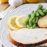 This Dutch Oven Roasted Chicken is the ultimate one-pot meal! Juicy chicken with a crispy golden brown skin is roasted to perfection with lemon and garlic, along with potatoes that soak up all the delicious flavors.