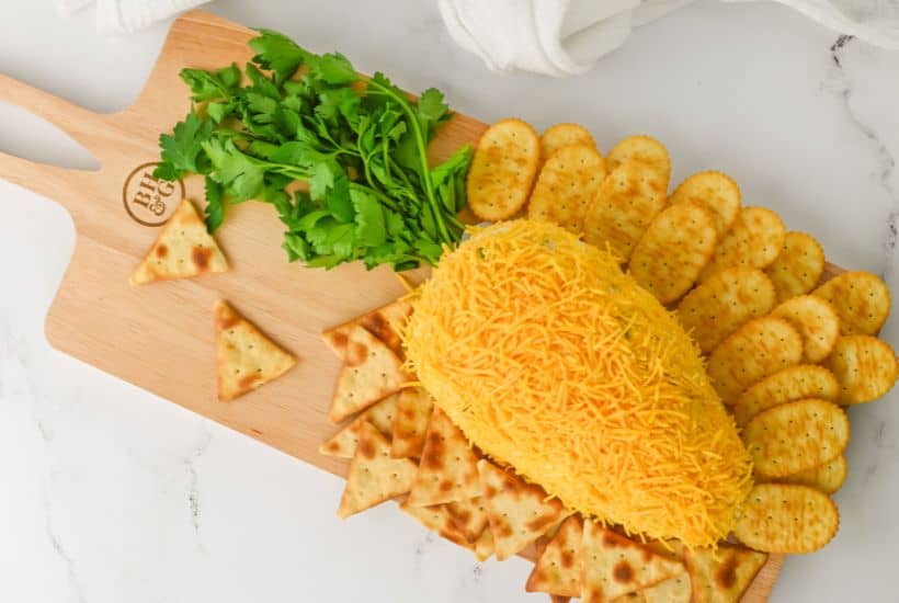 Get ready to wow your guests this Easter with the most adorable and delicious carrot-shaped Easter Cheese Ball! This whimsical Carrot Cheeseball appetizer is sure to steal the show with its festive carrot shape and irresistible flavors. Learn how to turn a simple cheese ball recipe into a great make-ahead appetizer for your Easter Dinner.