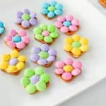 If you're looking for an easy springtime treat, you’re going to love these Pretzel Flowers with M&Ms! This recipe effortlessly blends the salty crunch of butter snap pretzels with pastel Easter M&Ms and white chocolate to make an adorable sweet treat.