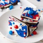 If you're looking for a fun and festive dessert to celebrate your patriotic spirit, this Red, White, and Blue Chocolate Bark is the perfect treat. It's a simple, no-bake recipe that combines the rich flavors of white and semi-sweet chocolate with bright colors that make it perfect for any American holiday!