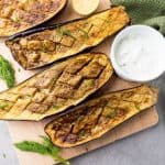 If you're looking for a delicious and healthy side dish, this Grilled Eggplant with Yogurt Sauce is a must-try. The tender, smoky eggplant goes perfectly with the creamy, garlic yogurt sauce, making it the perfect dish to serve with any meal.
