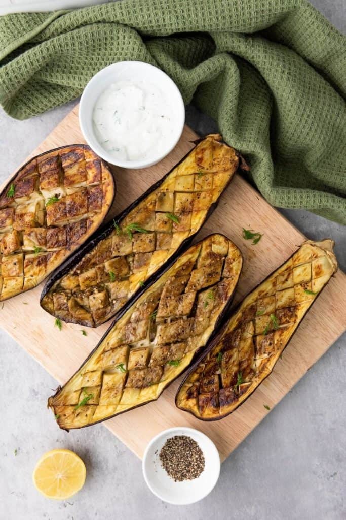 If you're looking for a delicious and healthy side dish, this Grilled Eggplant with Yogurt Sauce is a must-try. The tender, smoky eggplant goes perfectly with the creamy, garlic yogurt sauce, making it the perfect dish to serve with any meal.