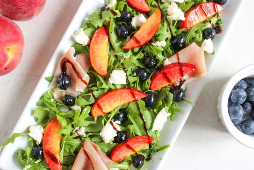 For a fresh twist on a summer classic, you’ll love this Peach Caprese Salad. It's a perfect mix of sweet and savory that comes together in just 5 minutes. This salad is just made for those hot days when you want something light and delicious without turning on the oven.