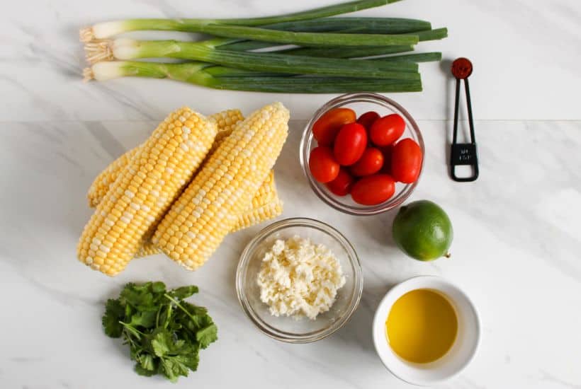 The taste of fresh summer corn shines in this flavorful Charred Corn Salad. Bursting with the sweetness of roasted corn, the freshness of cilantro, and the tang of fresh lime juice, this dish is a perfect side dish for a summer cookout!