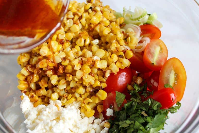 The taste of fresh summer corn shines in this flavorful Charred Corn Salad. Bursting with the sweetness of roasted corn, the freshness of cilantro, and the tang of fresh lime juice, this dish is a perfect side dish for a summer cookout!