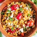 The taste of fresh summer corn shines in this flavorful Charred Corn Salad. Bursting with the sweetness of roasted corn, the freshness of cilantro, and the tang of fresh lime juice, this dish is a perfect side dish for a summer cookout!