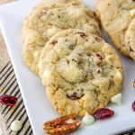 These Cranberry Pecan Cookies with White Chocolate are amazing. They're packed with tart cranberries, crunchy pecans, and creamy white chocolate chips - a flavor combo that's hard to beat. The best part is they're super easy to make and perfect for any occasion. You can bake them for the holidays or just when you're craving something sweet