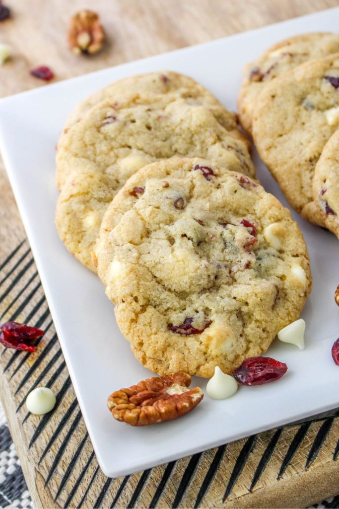 These Cranberry Pecan Cookies with White Chocolate are amazing. They're packed with tart cranberries, crunchy pecans, and creamy white chocolate chips - a flavor combo that's hard to beat. The best part is they're super easy to make and perfect for any occasion. You can bake them for the holidays or just when you're craving something sweet