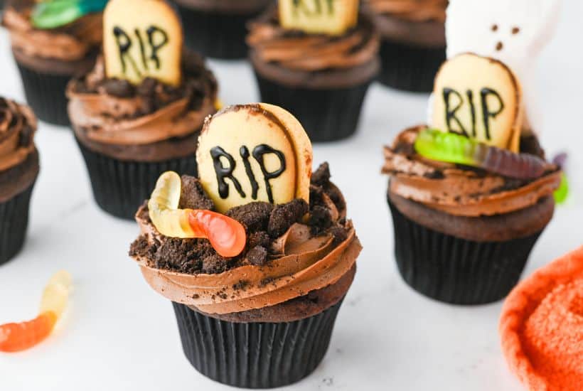 These Halloween Graveyard Cupcakes are a breeze to make, even if you're not a baking wizard. Starting with a box of Devil's Food cake mix means you'll have perfectly moist, chocolatey cupcakes every time. And let's be honest, on busy Halloween nights, we could all use a little shortcut magic!