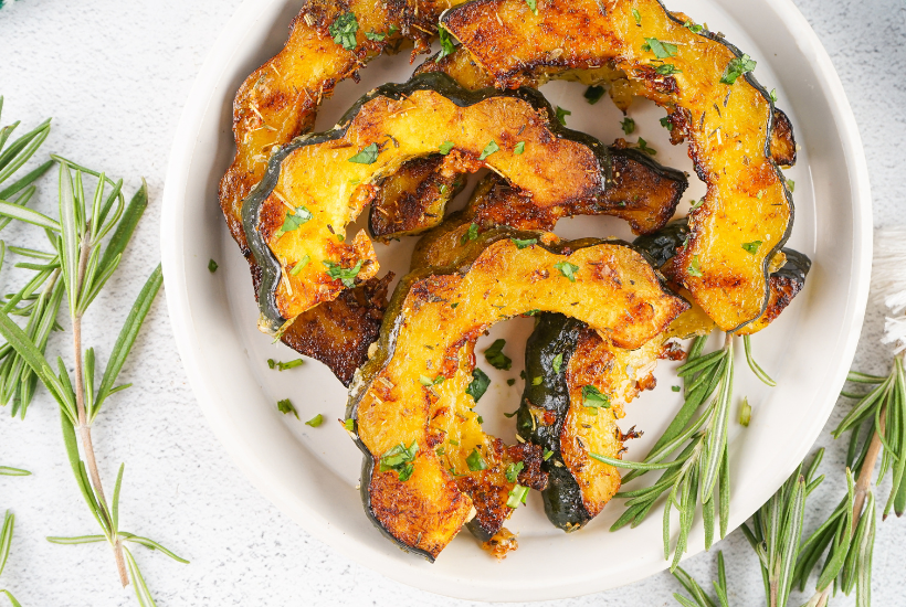 These Roasted Acorn Squash Slices are a super tasty, quick, and easy side dish. With few ingredients and minimal cook/prep time, this fall dish is great as a last-minute addition. The rich flavors of acorn squash are heightened by the aromatic herbs and brought full circle with the addition of parmesan and seasonings.