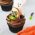 These Halloween Graveyard Cupcakes are a breeze to make, even if you're not a baking wizard. Starting with a box of Devil's Food cake mix means you'll have perfectly moist, chocolatey cupcakes every time. And let's be honest, on busy Halloween nights, we could all use a little shortcut magic!